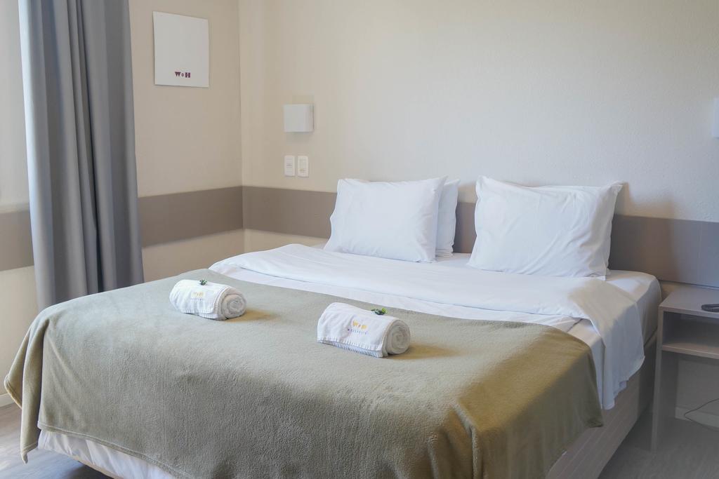 Work Hotel Design São Leopoldo Quarto foto